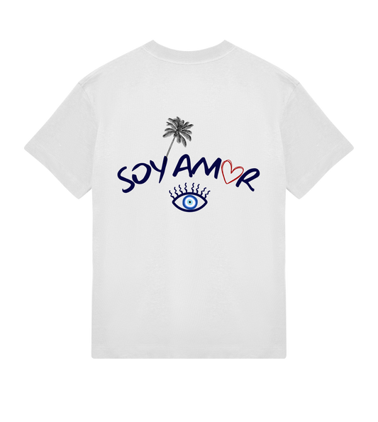T-shirt blanc Soy Amor vu de dos présentant un grand visuel composé d’un palmier, du mot “SOY AMOR” en bleu avec un cœur rouge, et d’un œil bleu stylisé placé au centre.